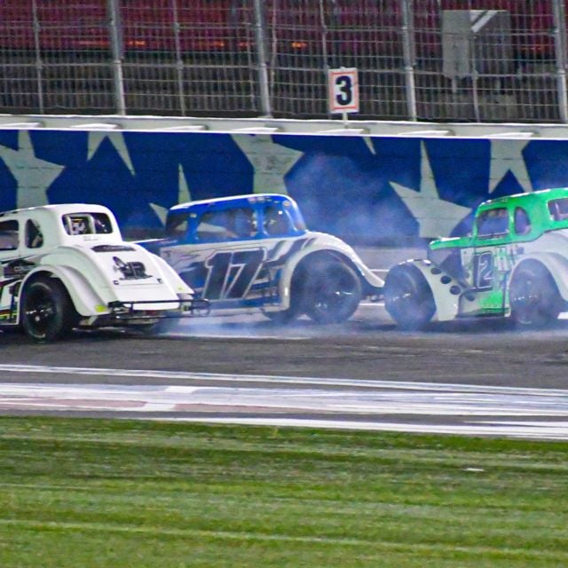 Ben Morabito (17) working to save his Legend Car around Spencer Bradshaw (99) and Colton Hale (12).