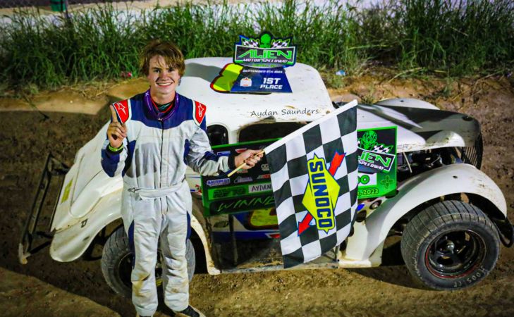 Aydan Saunders poses for a victory picture following his victory at Alien Motor Speedway on September 9, 2023.