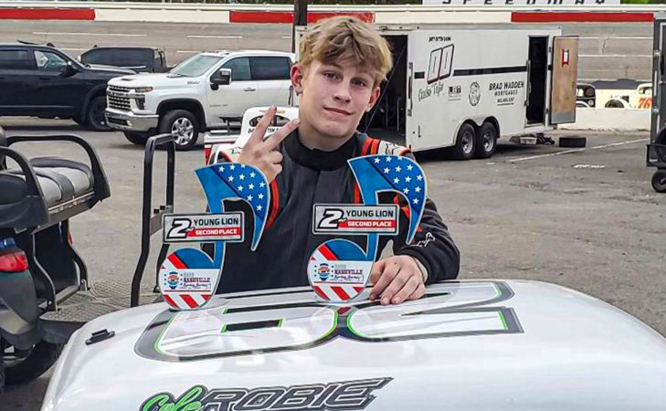 Cole Robie poses with two 2023 Nashville Spring Series trophies at Nashville Fairgrounds Speedway