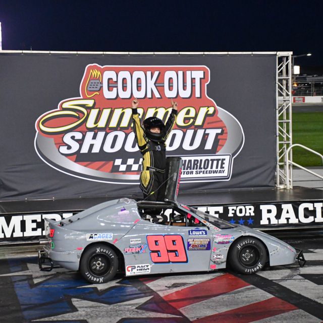 Carter Clapp celebrates on the fronstretch of Charlotte Motor Speedway after his Bandits Division victory.