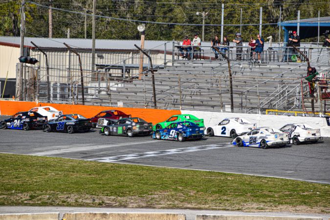 The green flag for the Round 2 Bandits race