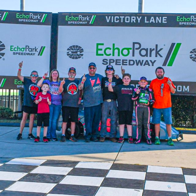 Carter Clapp and family celebrate his win in EchoPark Speedway victory lane.