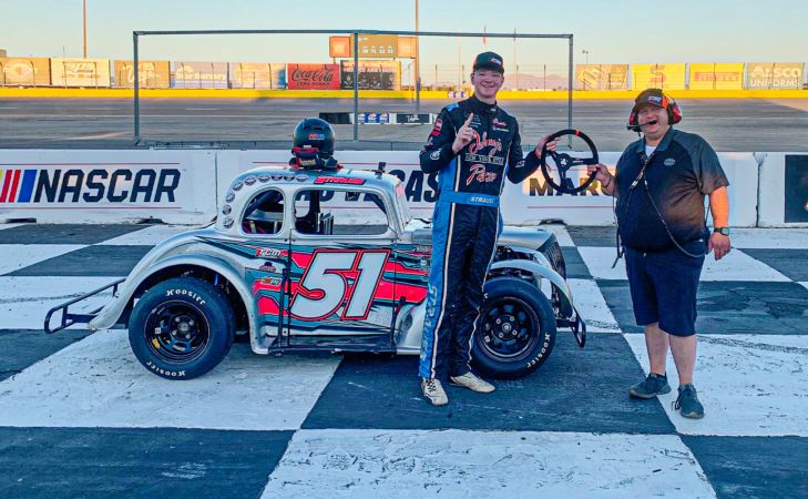 Donovan Strauss (left) is handed his brand-new MPI steering wheel from Race Director, Kyle McGowan (right), after winning the 2023 Pro Division Race of Champions presented by MPI race.