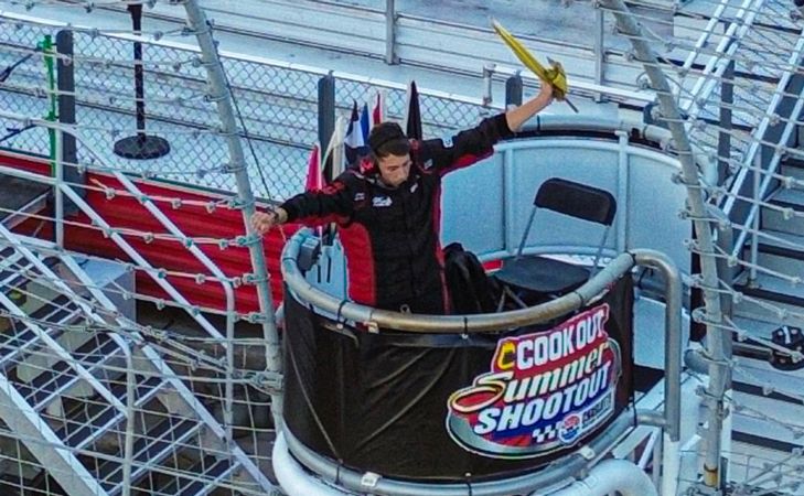 Nicholas Bronson flagging practice at Charlotte Motor Speedway