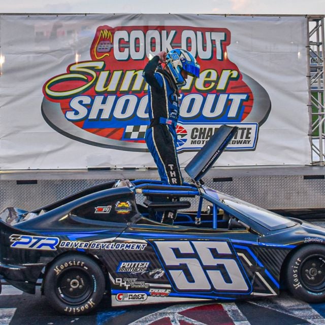 Bandolero Outlaws Division points leader, Landon Thrasher, celebrating a victory during the 2025 Cook Out Summer Shootout at Charlotte Motor Speedway. 