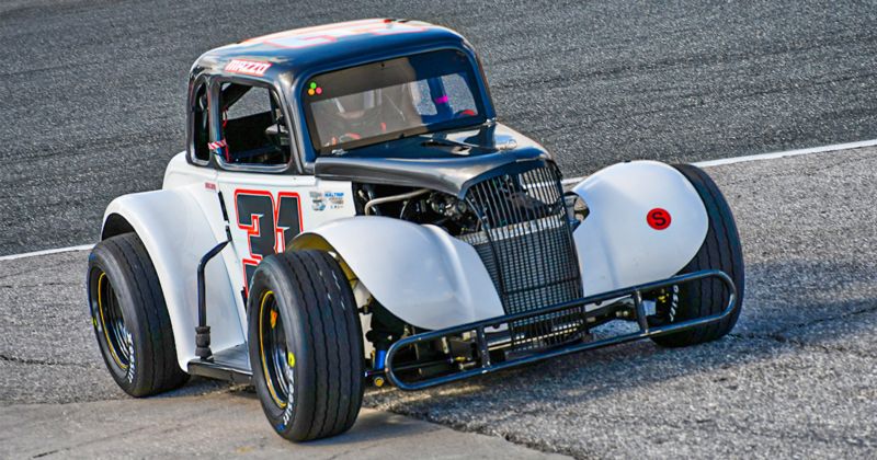 Sam Mazzo rolls his Legend Car to the infield staging area at Citrus County Speedway.