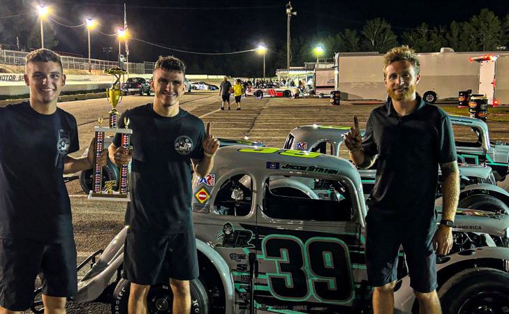 Landen Lewis (left), Jacob Staten (center), and Joe Ryan (right) pose for a victory picture.